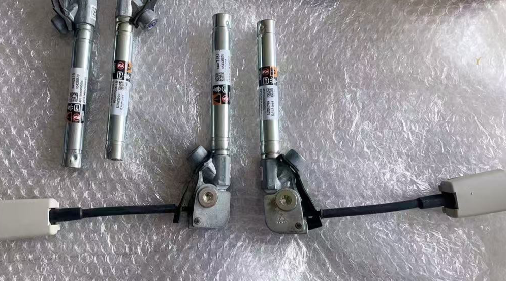 19-25 BLAZER 18-24 ENCLAVE FRONT LH RH SEAT BELT TENSIONERS NEW OEM 2pcs BLACK WHITE
