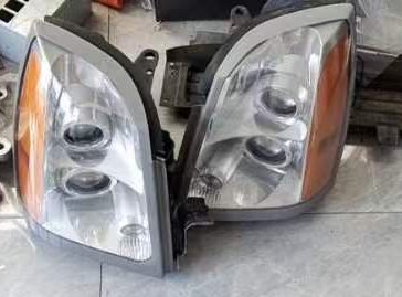 2004-2009 CADILLAC SRX ECE EURO EXPORT HEADLIGHTS USED OEM GM