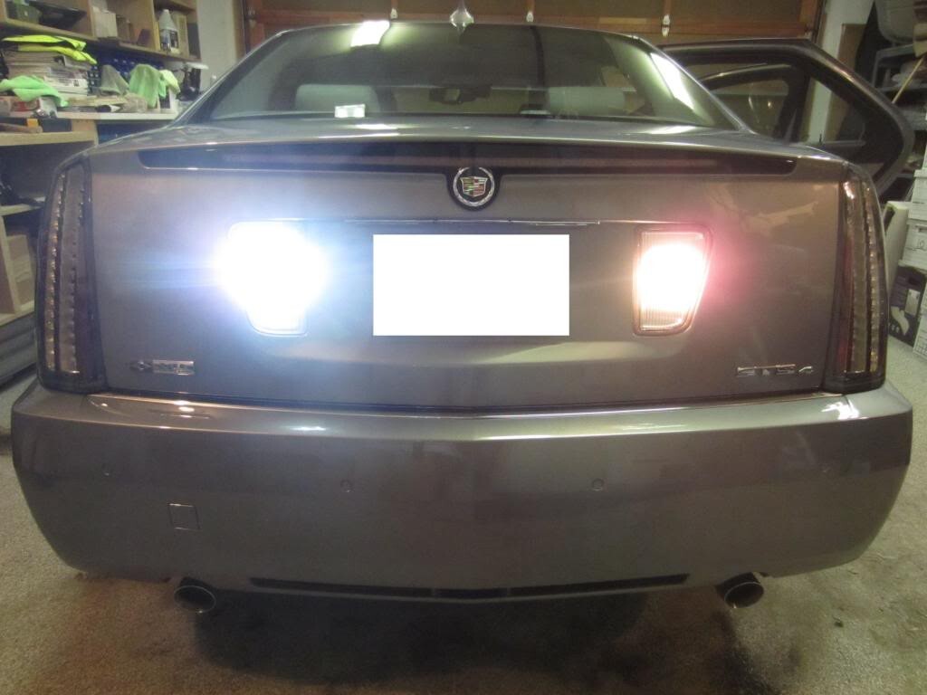 2005-2011 CADILLAC STS LED ECE CLEAR REVERSE LAMPS PAIR SET NEW USED OEM